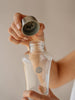 Feather glass water bottle with metallic lid