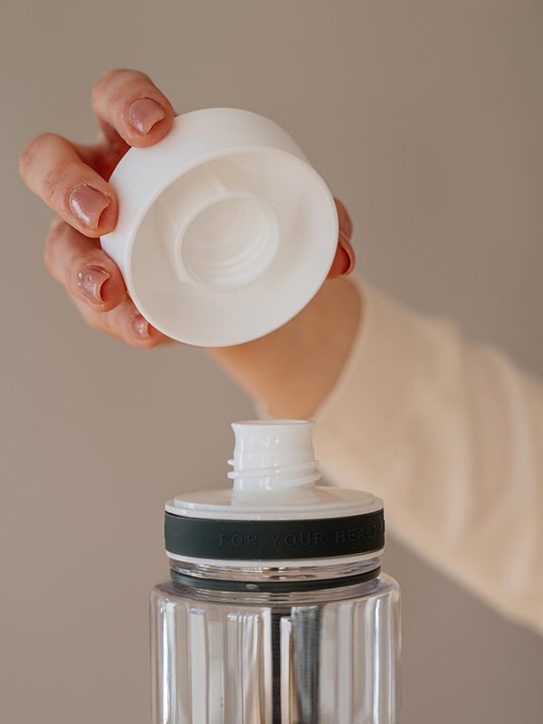 EQUA BPA FREE water bottle, Plain White, close up of the lid and mouthpiece, white color
