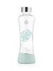 EQUA Monstera glass water bottle on white paper
