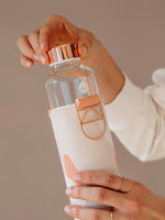 EQUA glass water bottle Heavens with faux leather cover.