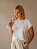 Girl drinking from Active Berry glass bottle