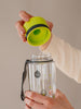 EQUA Bottiglia d'acqua BPA FREE, foglie verdi, primo piano del coperchio, colore verde brillante e grigio