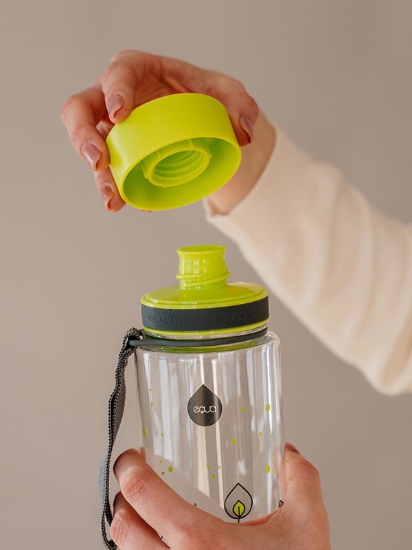 EQUA BPA FREE water bottle, Green leaves, close up of the lid and mouthpiece, bright green and grey color