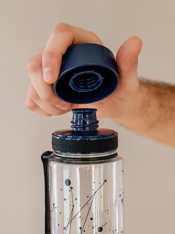 EQUA BPA FREE water bottle, Universe, close up of the lid and mouthpiece, dark blue color