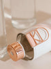 Lava Glass Water Bottle with Rose Gold details of the metal holder and faux leather with pink marble print cover by EQUA